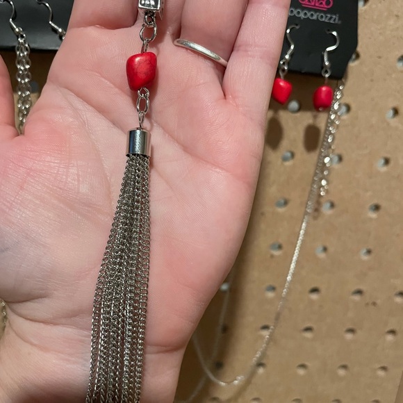 Long silver necklace with a silver triangle, red crackle, and fringe. - Picture 4 of 5